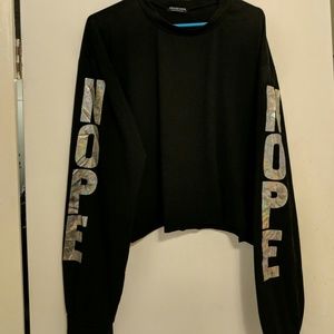 NOPE sleeved cropped shirt. Fashion Nova